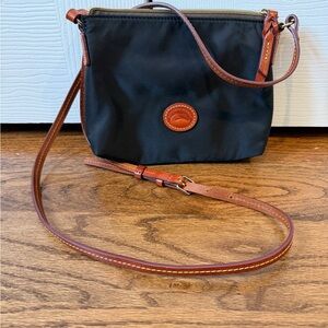 Dooney and Bourke nylone Black Crossbody Bag with Brown Leather Strap